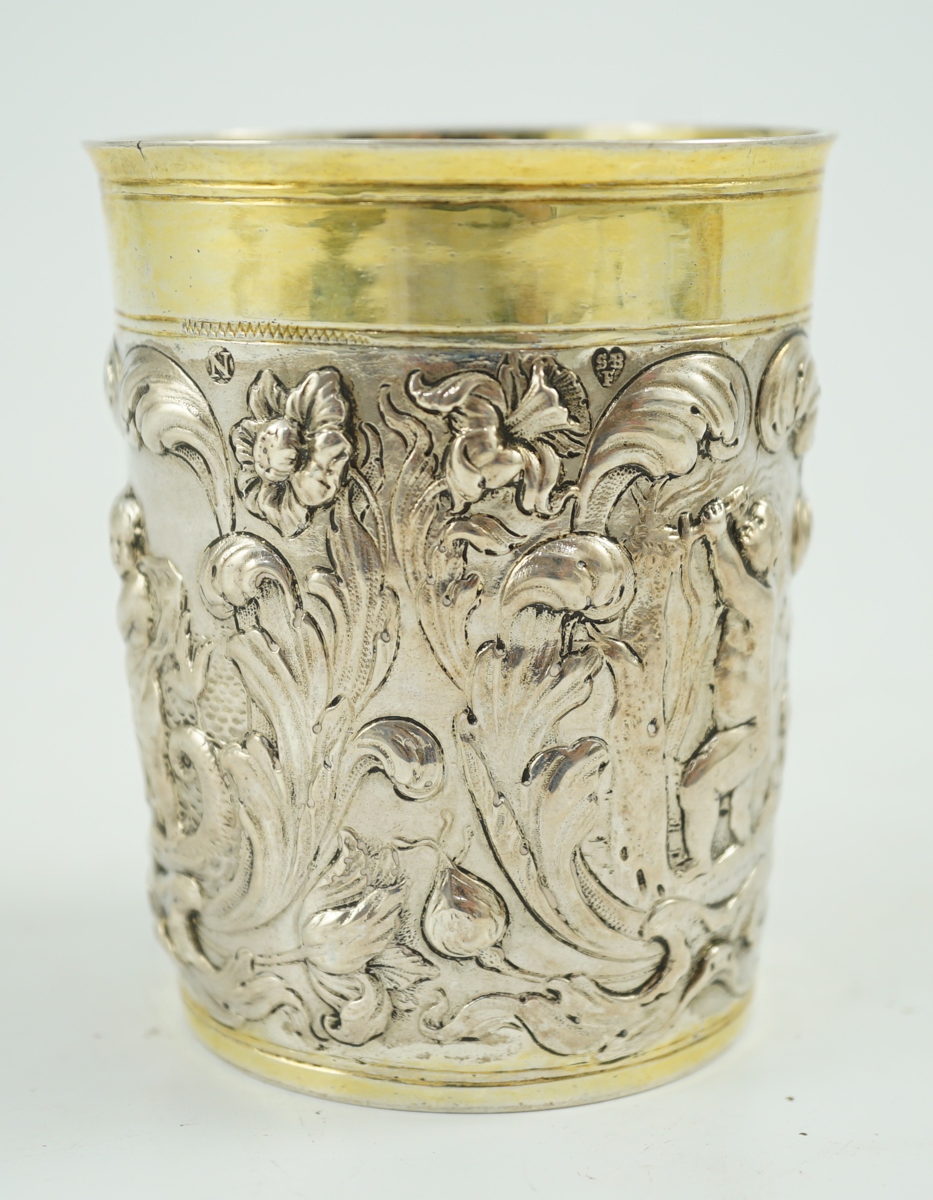 A late 18th century German embossed parcel gilt silver beaker, maker SBF